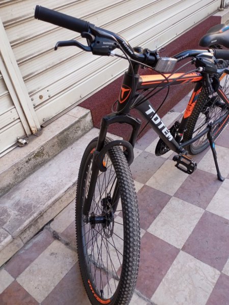 Tirane, shes biciklete per meshkuj Biçiklete Totem 29 Inch portokalli 250 €